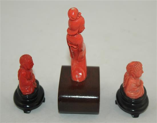 Three Chinese coral figures, wood stands, the lady 8.4cm excl. stand